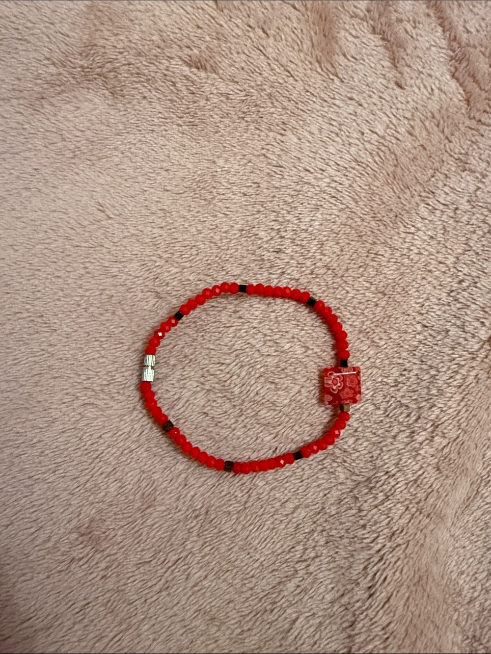 Red Beaded Stretch Bracelet with Floral Accent